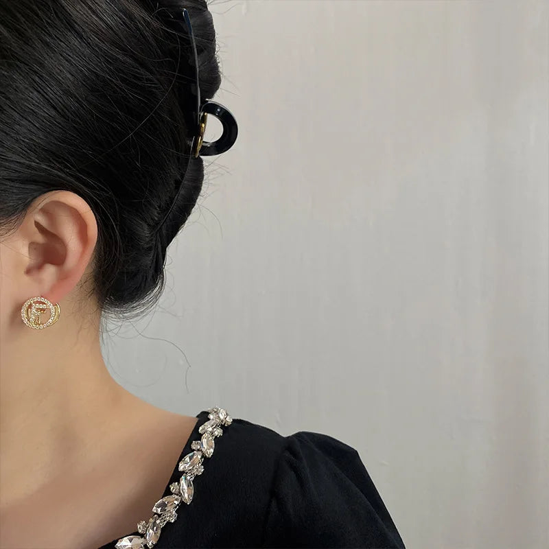 Fashionable Earrings Feature A Super-shiny Ear Clasp, Simple and Niche Design, Round Shape, and Compact Size